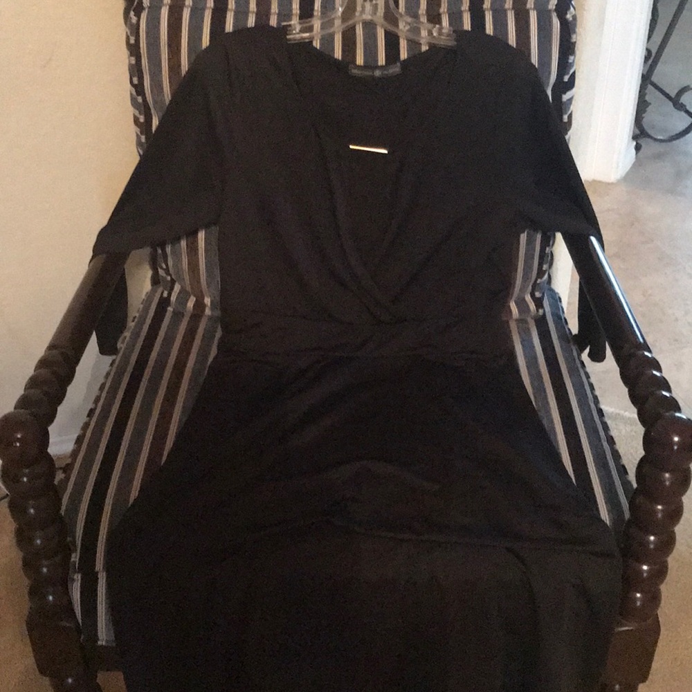 Black 3/4 sleeve dress.